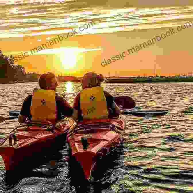 A Couple Kayaking Through The Tranquil Waters Of Seagrove Beach. The Inn At Seagrove (South Carolina Sunsets 4)