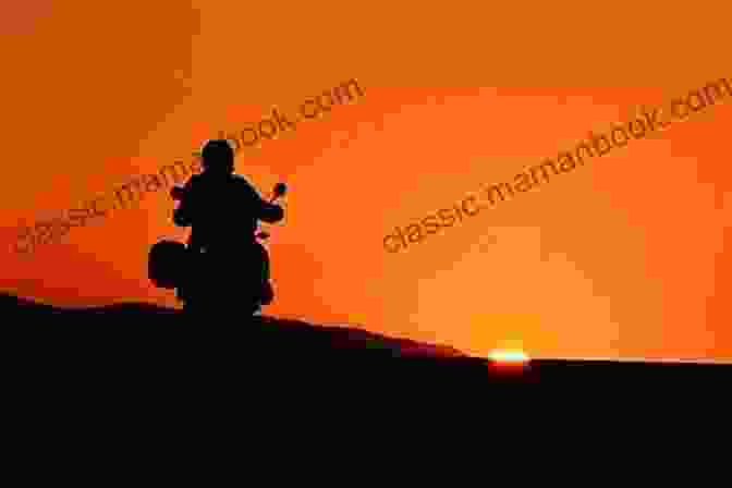 A Lone Biker Riding Into A Beautiful Sunset The Riders (The Riders 1)